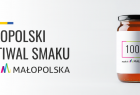 Zdjęcie przedstawia plakat ze słoikiem i napisem Małopolski Festiwal Smaku Made in Małopolska.