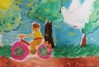 Trzecia nagroda. Autor: Piotr Doliwa. Obrazek. Chłopiec jadący na rowerze. Nad nim duży biały gołąb