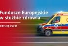 karetka pogotowia jedzie po drodze
