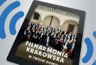 Plakat wydarzenia. Zdjęcie tabletu, na którym widnieje orkiestra filharmoniiorkiestra