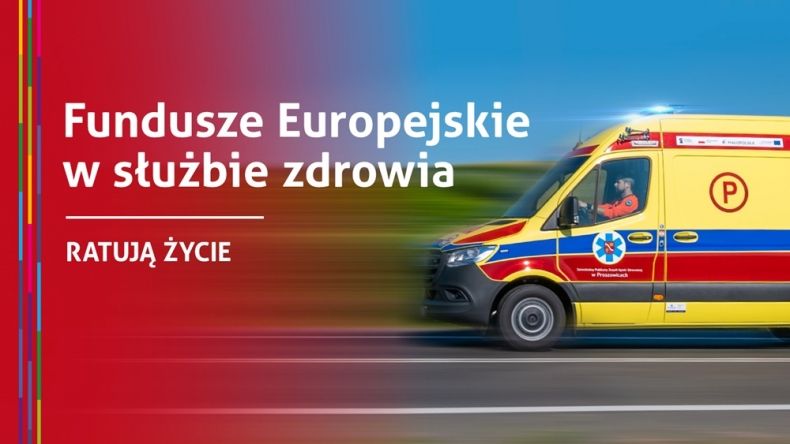 karetka pogotowia jedzie po drodze