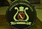 Bęben z logo Strażackiej Orkiestry Dętej.