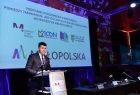 Przemawia wicemarszałek województwa małopolskiego Łukasz Smółka