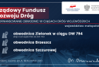 Plansza informacyjna wojewody małopolskiego. Dzięki rządowemu dofinansowaniu powstaną: obwodnica Zielonek w ciągu DW 794 - dofinansowanie 35 mln zł, obwodnica Brzeszcz - dofinansowanie 39,6 mln zł, obwodnica Szczurowej - dofinansowanie 35,4 mln zł