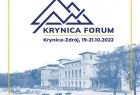 Napis Krynica Forum, Krynica Zdrój 19-21 października. W tle zdjęcie budynku pijalni głównej w Krynicy oraz poniżej napis Spotkajmy się w Krynicy