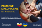 Plakat z przykładowym zdjęciem i informacją - Małopolska Tarcza Humanitarna.