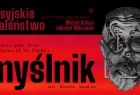 Plakat reklamowy spotkania "Myślnik". Po lewej stronie wypisane są informacje na temat wydarzenia, po prawej znajduje się głowa w okularach. Kolorystyka utrzymana jest w czerwono-czarnych barwach.