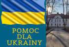 Po lewej widoczna flaga Ukrainy i napis o treści Pomoc dla Ukrainy. Po prawej zabytkowy gmach Szpitala Babińskiego otoczony drzewami.