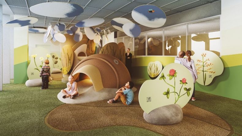Wizualizacja Akademii Dzieci. Przedstawia salę w której ustawione są urządzenia z motywami roślinnymi.