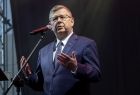 Marszałek Małopolski Witold Kozłowski, stoi przy mikrofonie - jest w trakcie przemowy. 