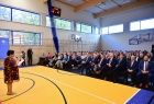 Uczestnicy wydarzenia siedzą na sali.