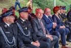 Wicemarszałek Ryszard Pagacz siedzi na widowni ze strażakami.