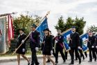 Strażackie delegacje i poczty sztandarowe w trakcie przemarszu