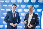 Marszałek Łukasz Smółka i redaktor TVP.