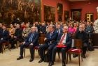 Zdjęcie przedstawia publiczność siedzącą na sali.