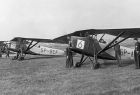 Samoloty RWD-8 (pierwsze dwa) na lotnisku w Katowicach; wrzesień 1936. Źródło: NAC