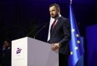 Prezydent Krakowa Aleksander Miszalski przy mównicy.